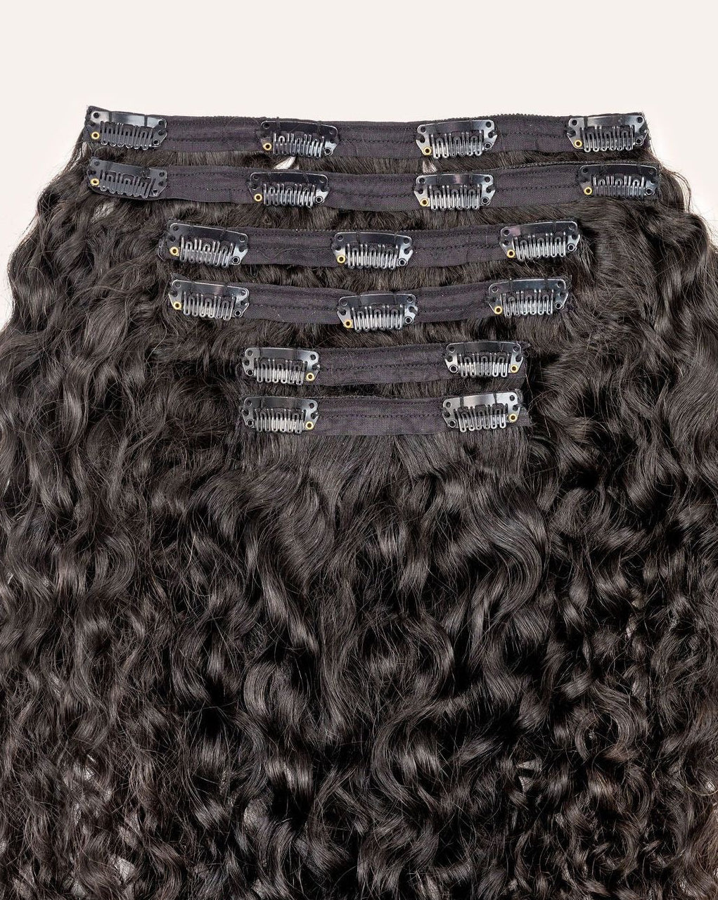 Curly clip in hair extensions